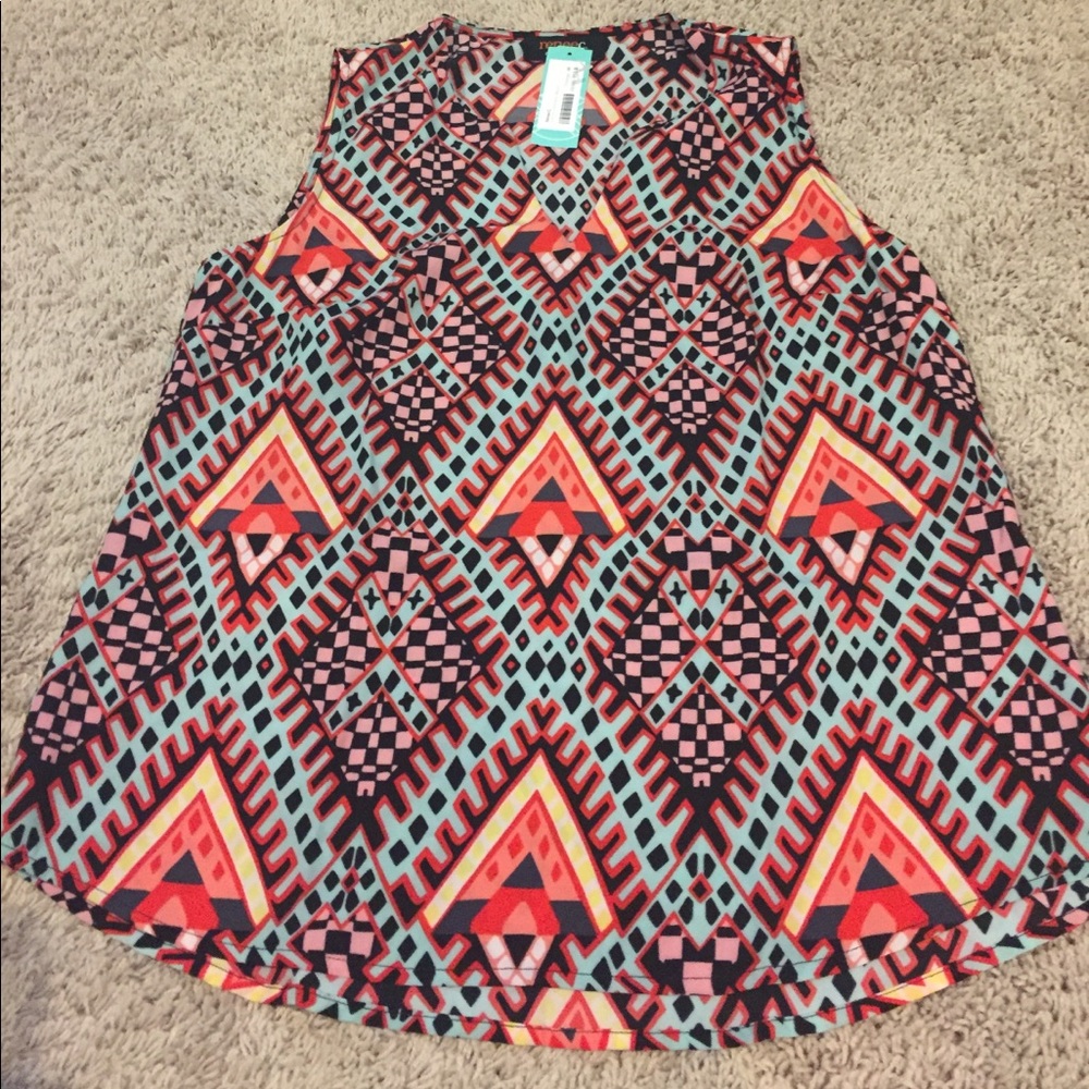 Reneec blouse size medium