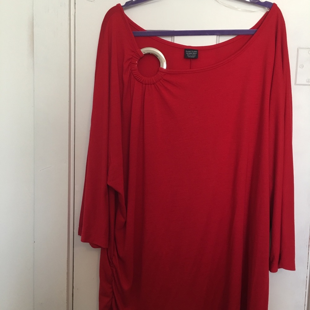 Red blouse with silver accent.