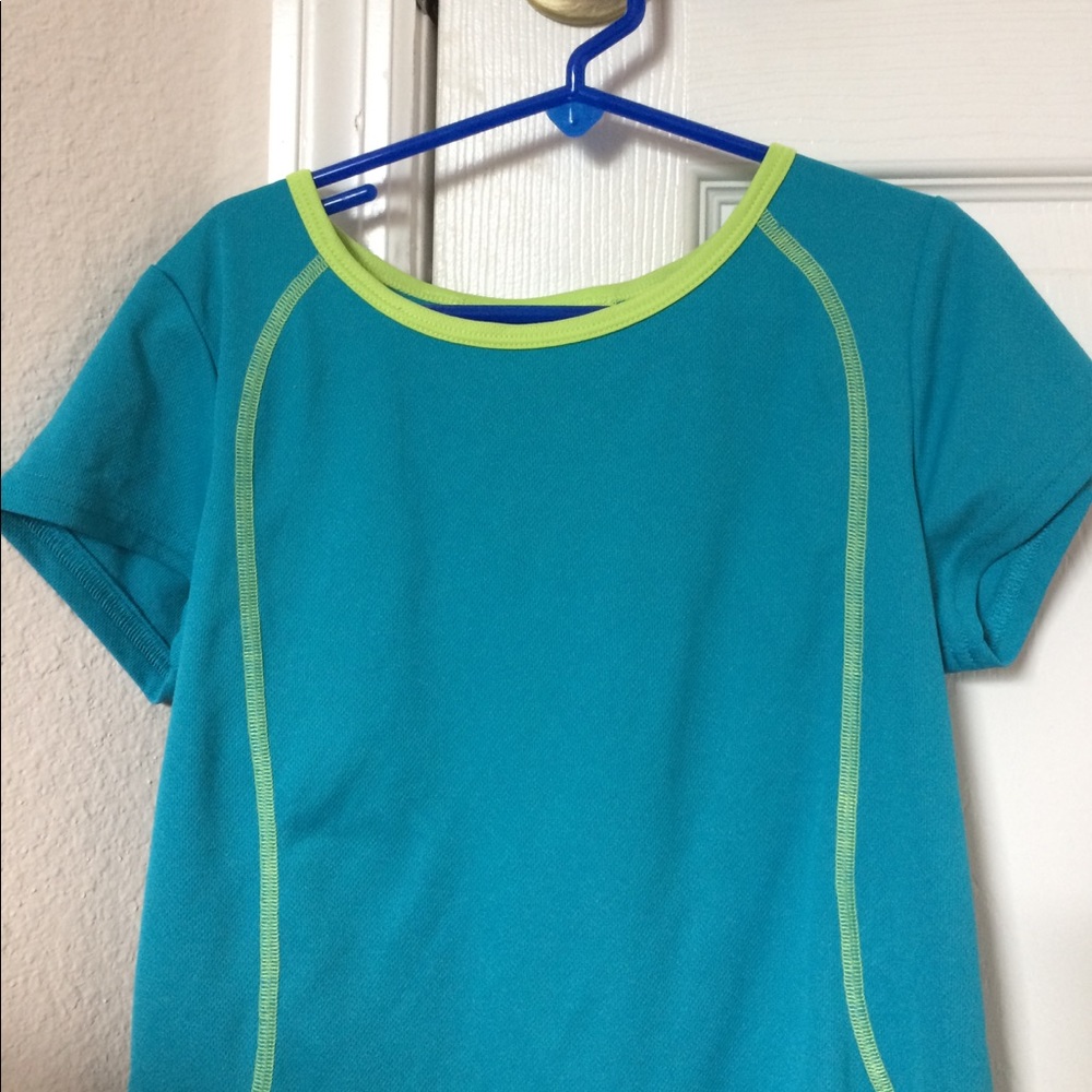 blue dri-fit t-shirt with yellow accents