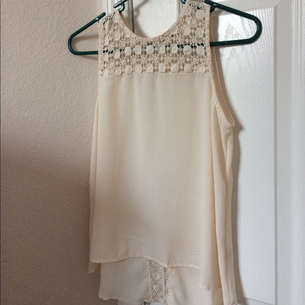 cream colored silk and lace sleeveless top