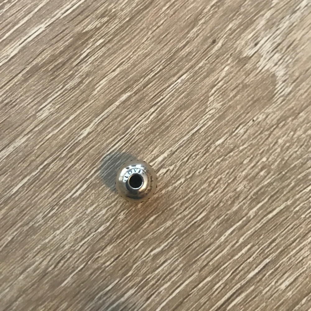 Pandora essence charm.