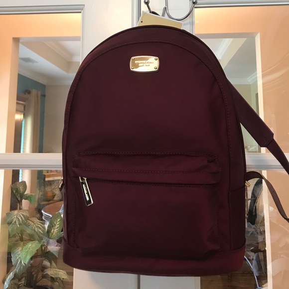 Michael Kors Handbags - Michael Kors Plum Backpack