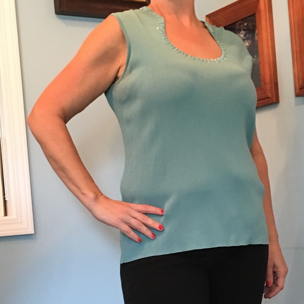 Beautiful sweater with beaded neckline