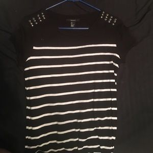 striped shirt with spikes on shoulders