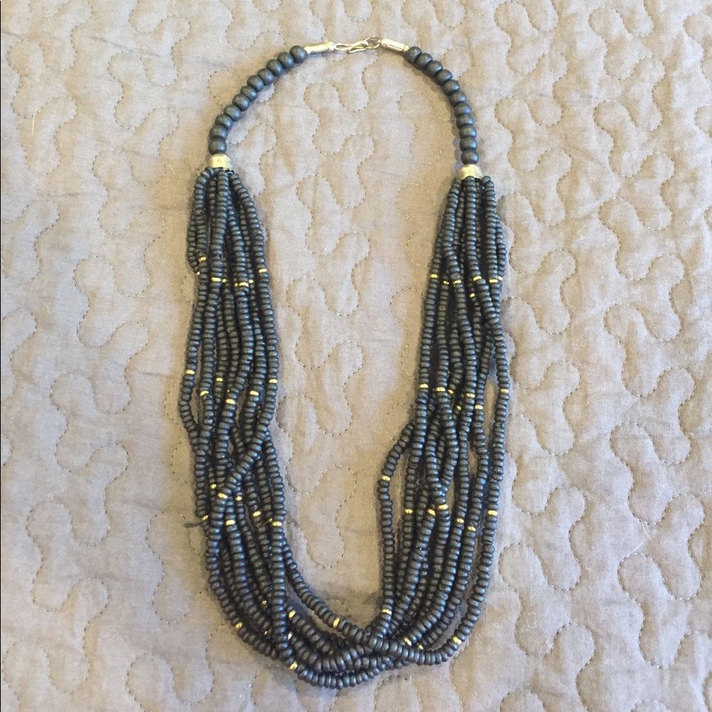Black beaded necklace with gold accents!