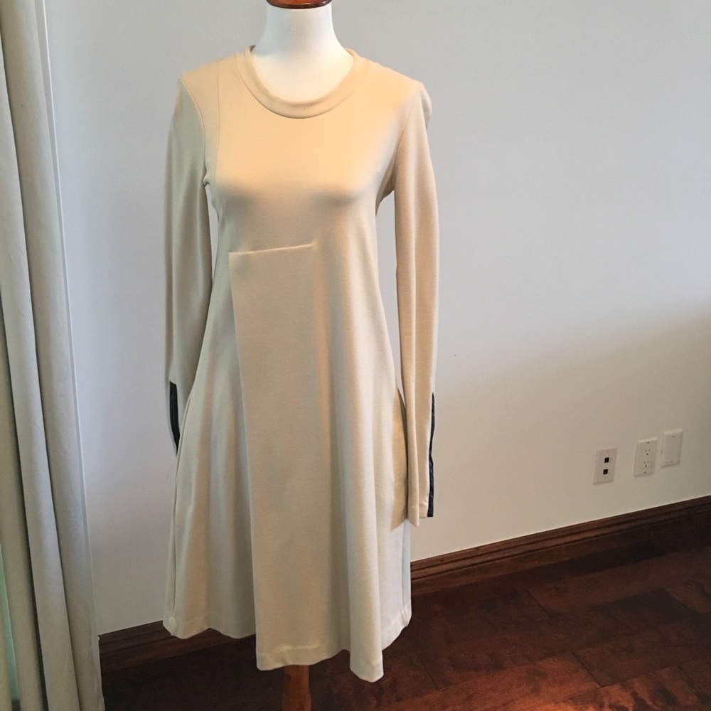 MIDI Dress with leather trim.