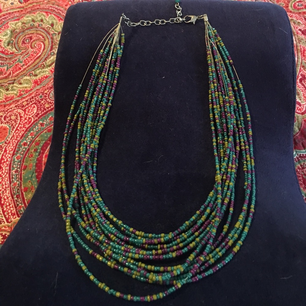 Multi strand necklace with multi color beads