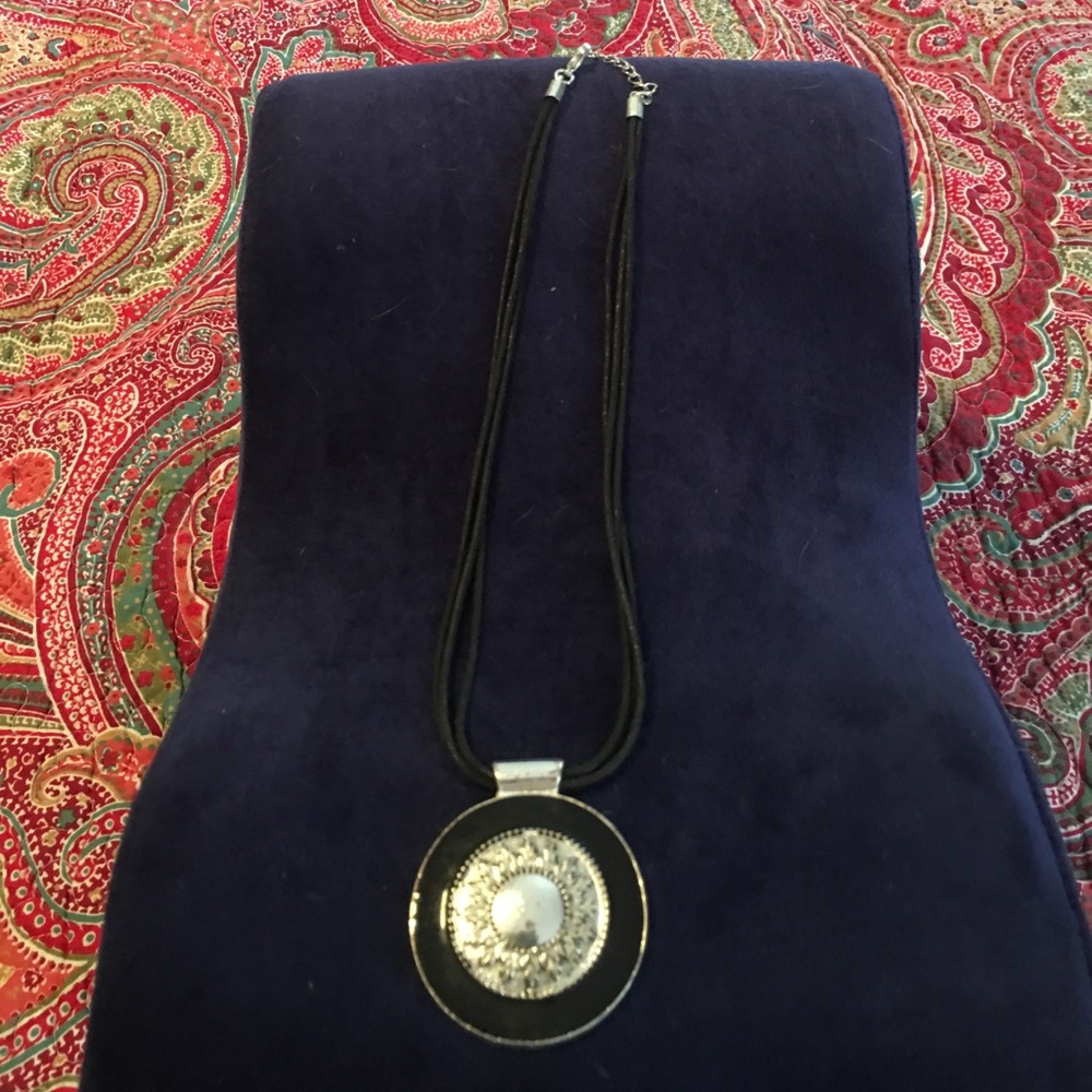 Black multi strand necklace with pendant