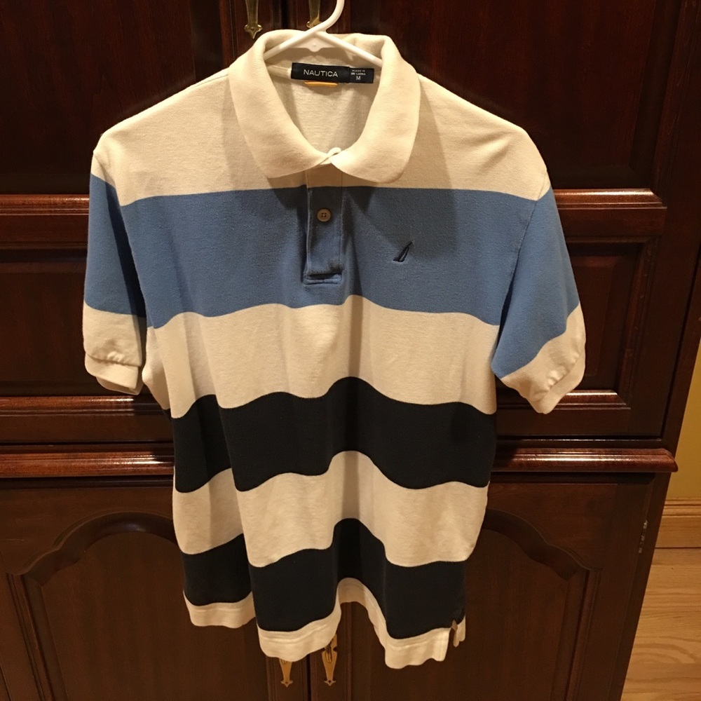 Nautical blue stripped shirt with color.
