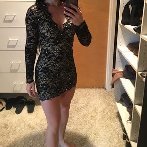 Black long sleeve lace dress with crystals by Holt