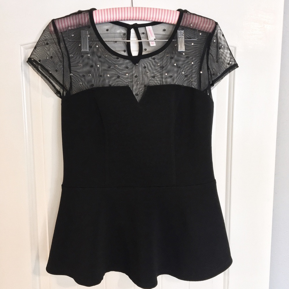 Black peplum shirt with studded mesh upper