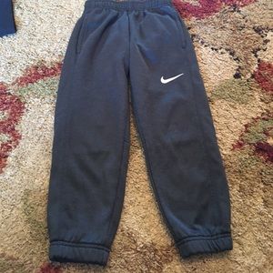 Nike gray pants.