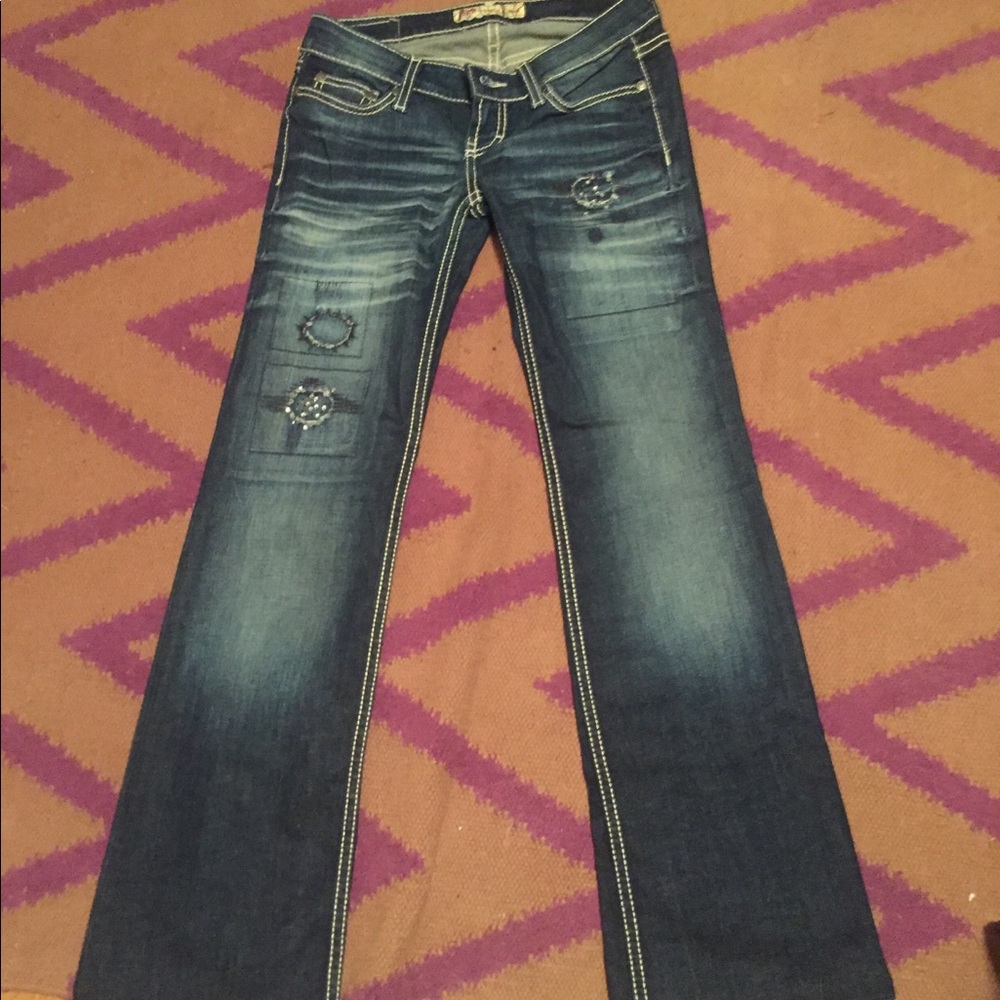 BKE patched looked bootleg jeans