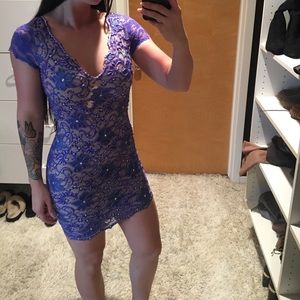 Purple keyhole back dress with crystals by Holt.