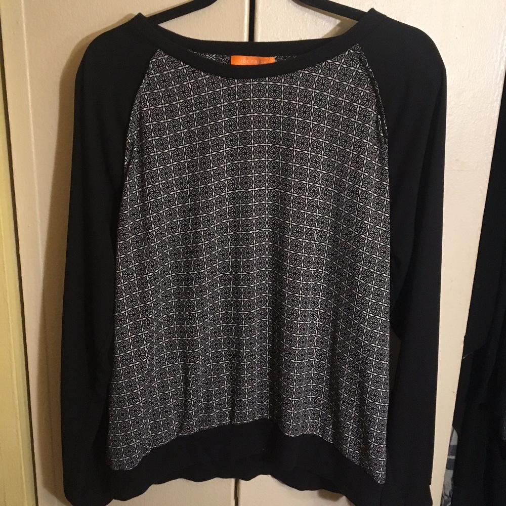 Black long sleeved shirt with celtic pattern on