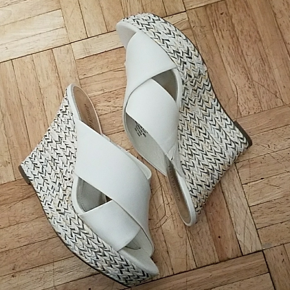 Jennifer Lopez white wedge sandals.