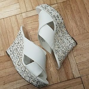 Jennifer Lopez white wedge sandals.