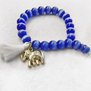 Blue marble beaded bracelet with charms