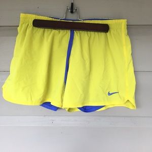 Yellow Nike shorts