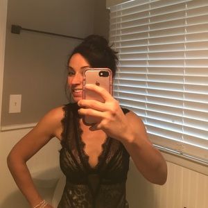 Super sexy form fitting lace Bebe Body Suit