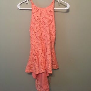 Tangerine Peplum Top. Brand New - Never worn.