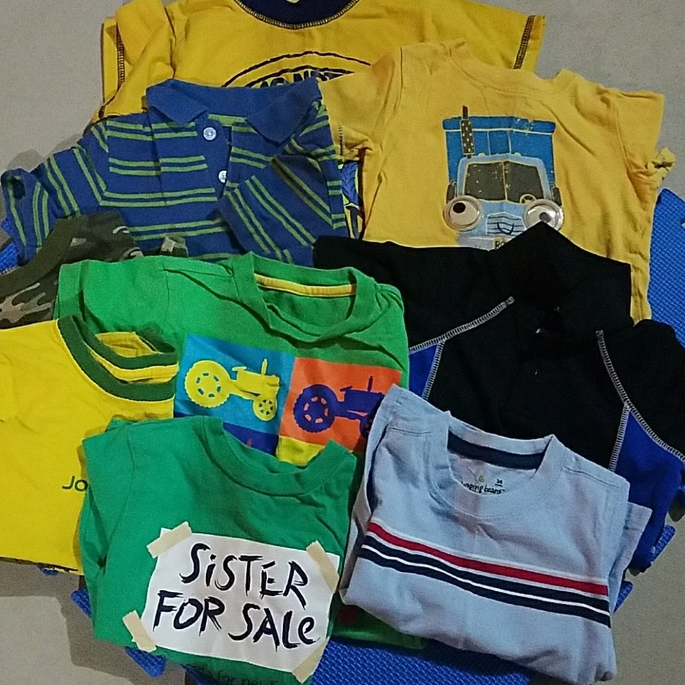 9 boys shirts size 2T. or 24 months