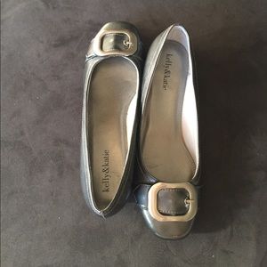 Grey 1" heel shoes with silver buckle design