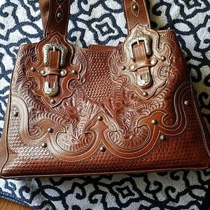 American West handbag. Pretty much brand new!