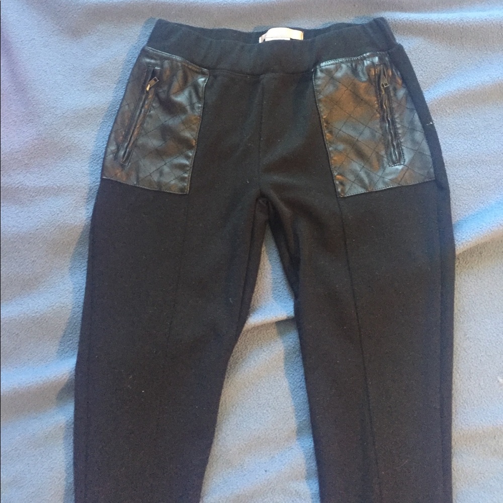 Black skinny pants with pleather pockets