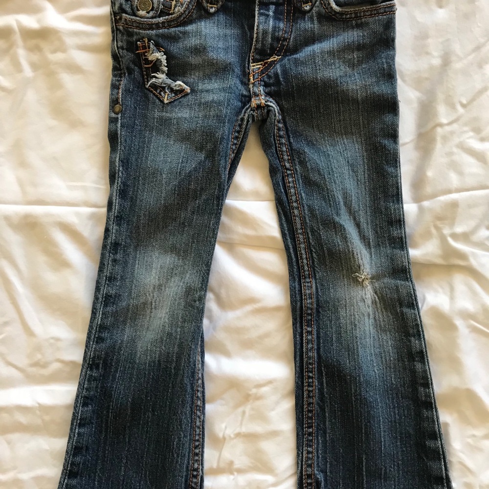Janis girl’s jeans size 4T. Never worn.