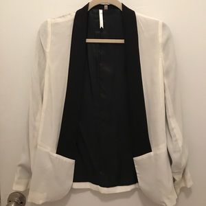 White and black blazer