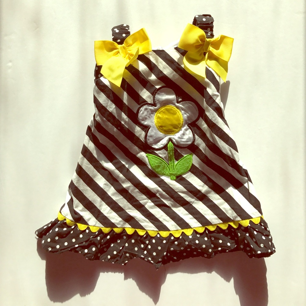 Black and White Striped Dress with Daisy Accent
