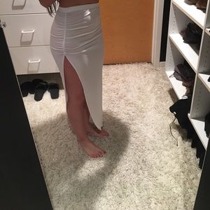 High waisted asymmetrical slit white skirt. NWT.