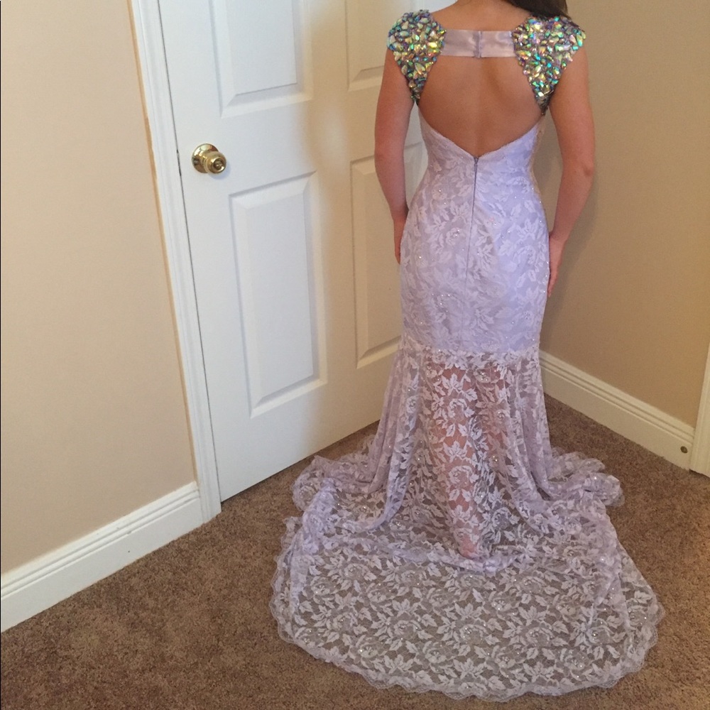 Flirt by Maggie Sottero purple lace prom dress