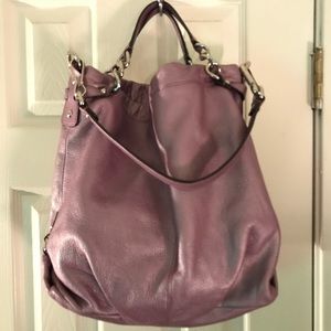 Lavender Coach slouch handbag. Never used.