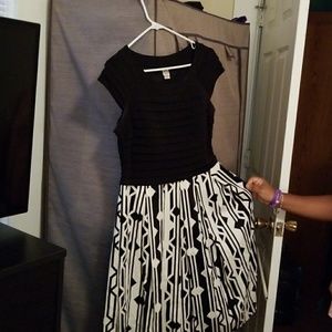 Dress. Black top withwhite black and white bottom.