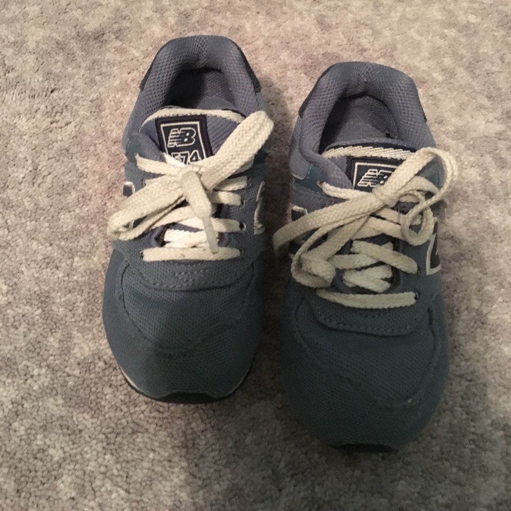 Boys New Balance shoes.