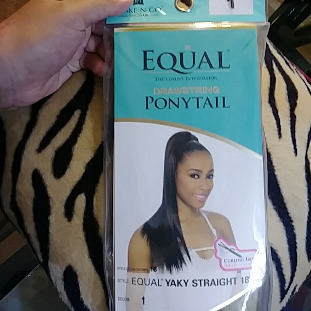 Long take straight black ponytail
