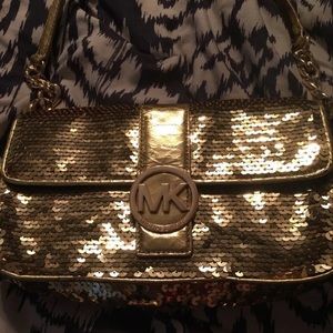Michael Kors gold handbag