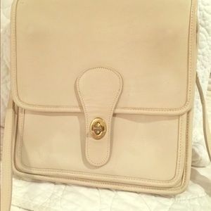 Coach vintage messenger crossbody in bone color