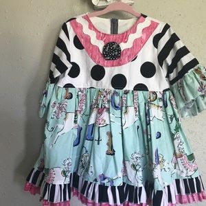 Carousel and numbers 3T dress boutique
