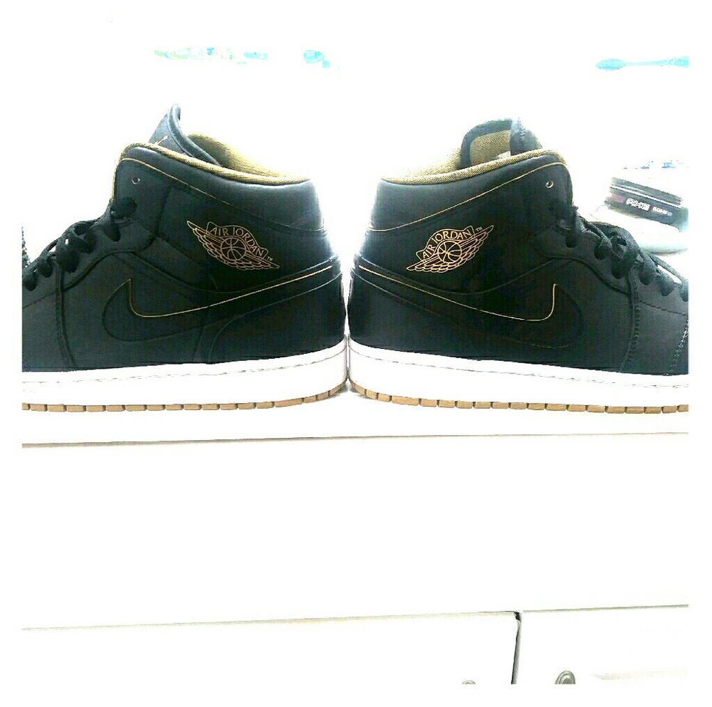 Air Jordans 1s Black and Gold