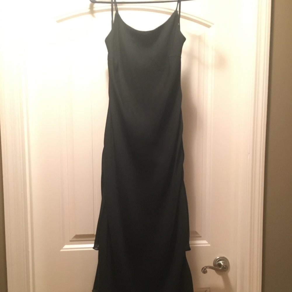 Black spaghetti strapped asymmetrical bottom dress