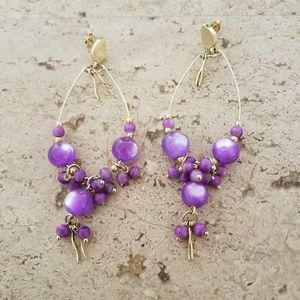 Purple beaded earrings from Brazil