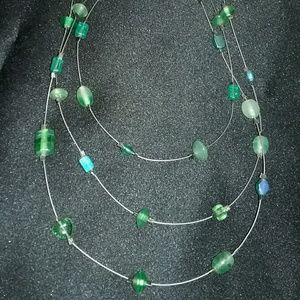 Green multi strand necklace
