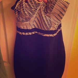 Form fitting black and white dress with neon pop!