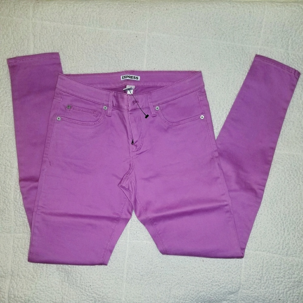 Express purple/pink skinny jeans
