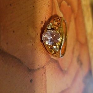 Light purple center stone w 2 circular rhinestones