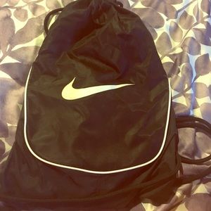 Iightly used black Nike drawstring bag