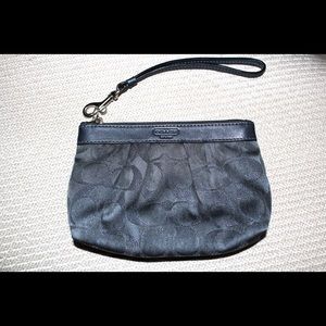 Dark grey Coach wristlet